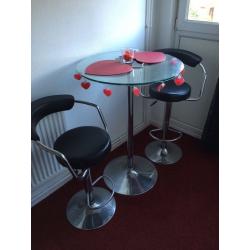 Glass bar table with 2 gas stools