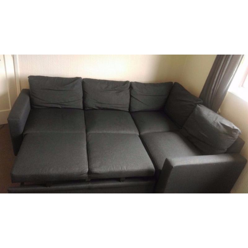 Fabric charcoal Double sofa bed, with storage.
