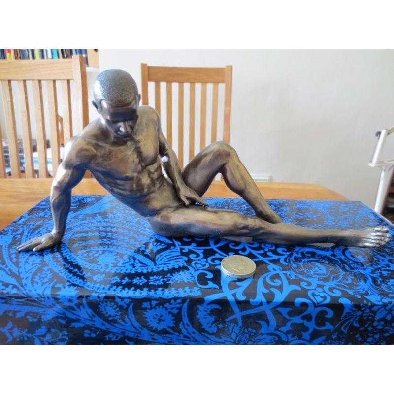 Six bronze effect Nude Male figurines