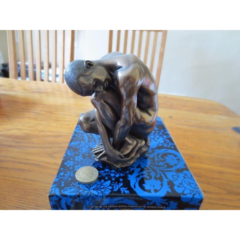 Six bronze effect Nude Male figurines