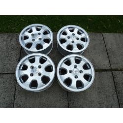 Mitsubishi Colt CZ2 set of 4 alloy wheels for re-furbishing.