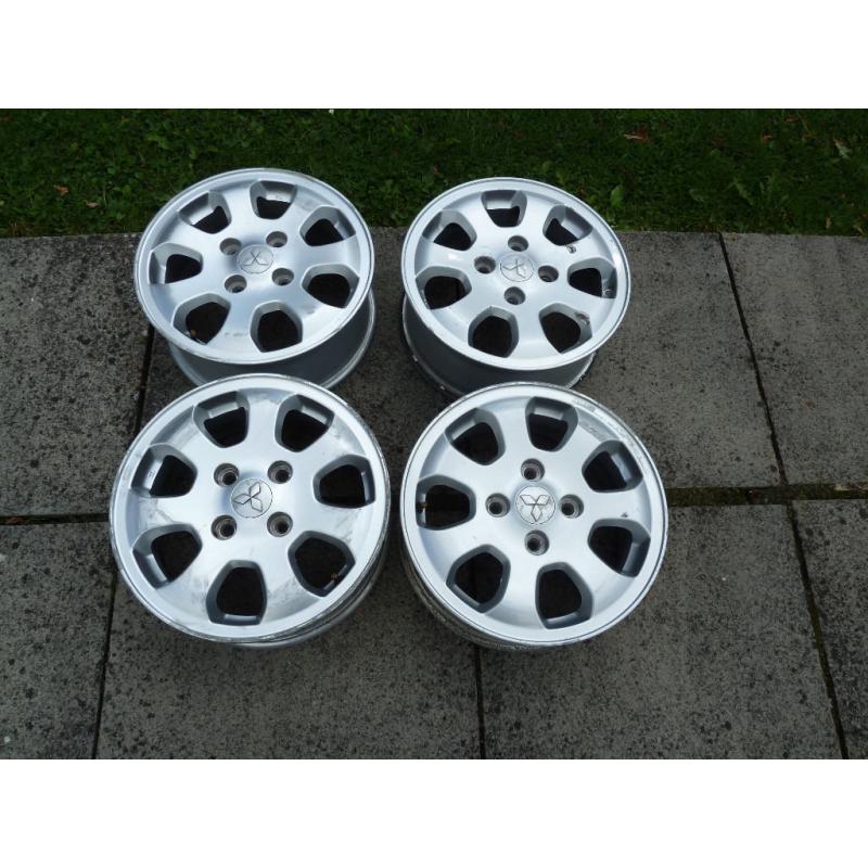 Mitsubishi Colt CZ2 set of 4 alloy wheels for re-furbishing.