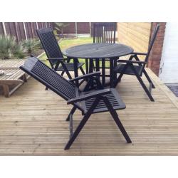 Garden table and reclining chairs