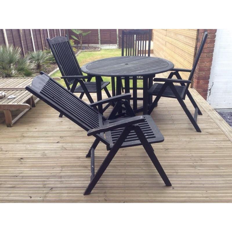Garden table and reclining chairs