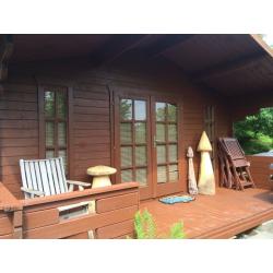 Wood cabin set in about an acre of woodland