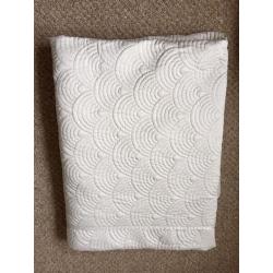 Ivory coloured bedspread