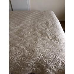 Ivory coloured bedspread