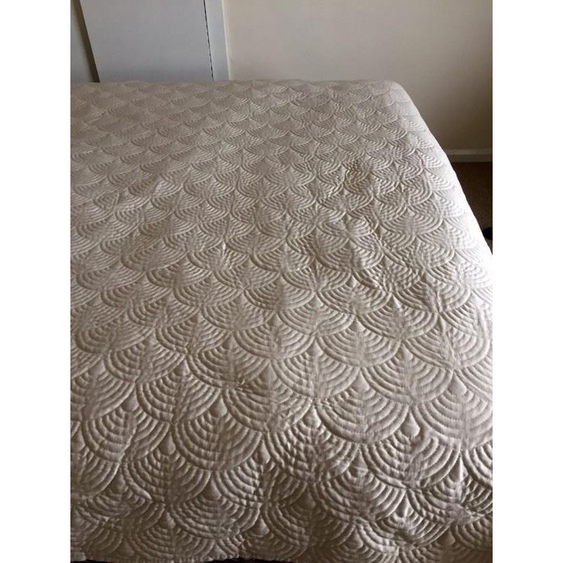 Ivory coloured bedspread