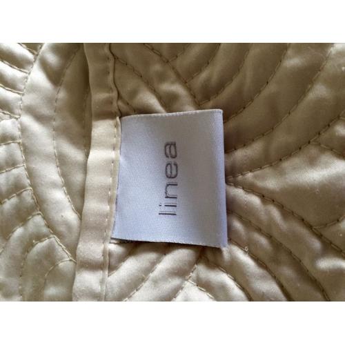 Ivory coloured bedspread