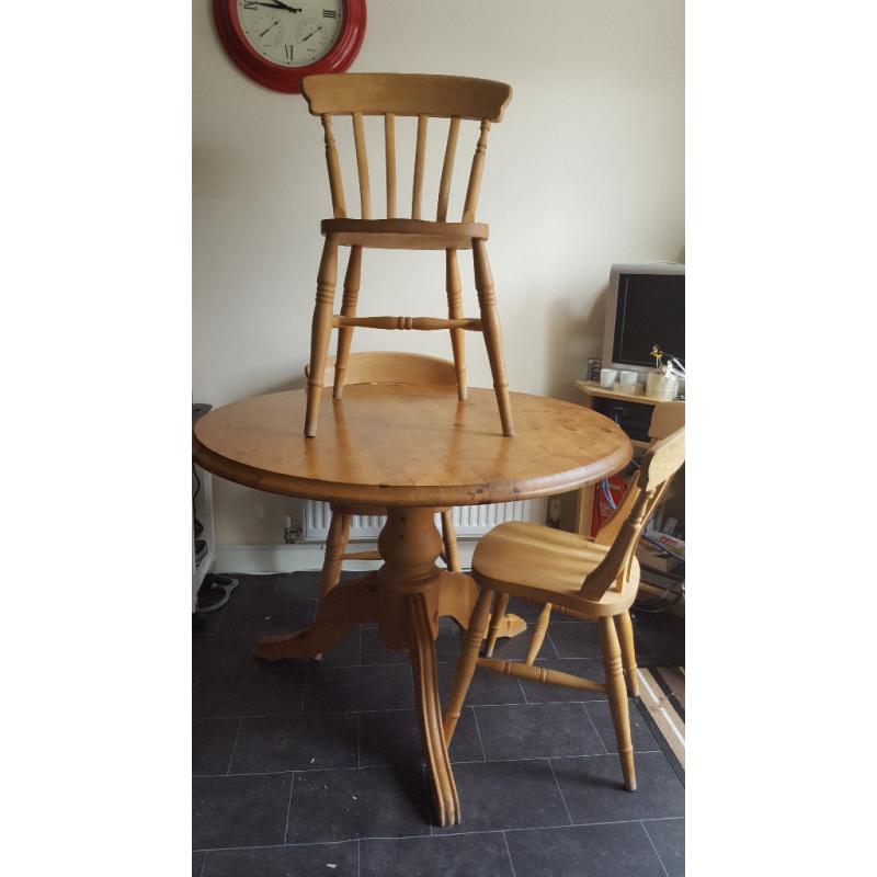 Solid pine round table and 4 chairs