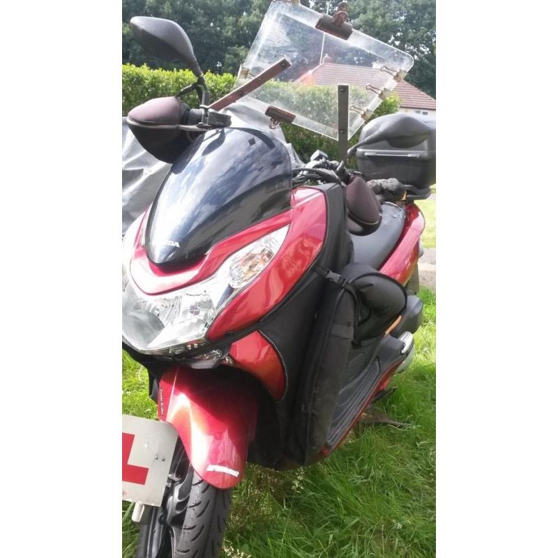 125 Honda PCx for sale excellent for commuting or knowledge.