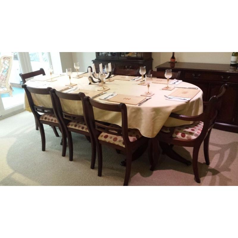 8-seater dining room table with 8 chairs