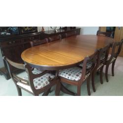8-seater dining room table with 8 chairs