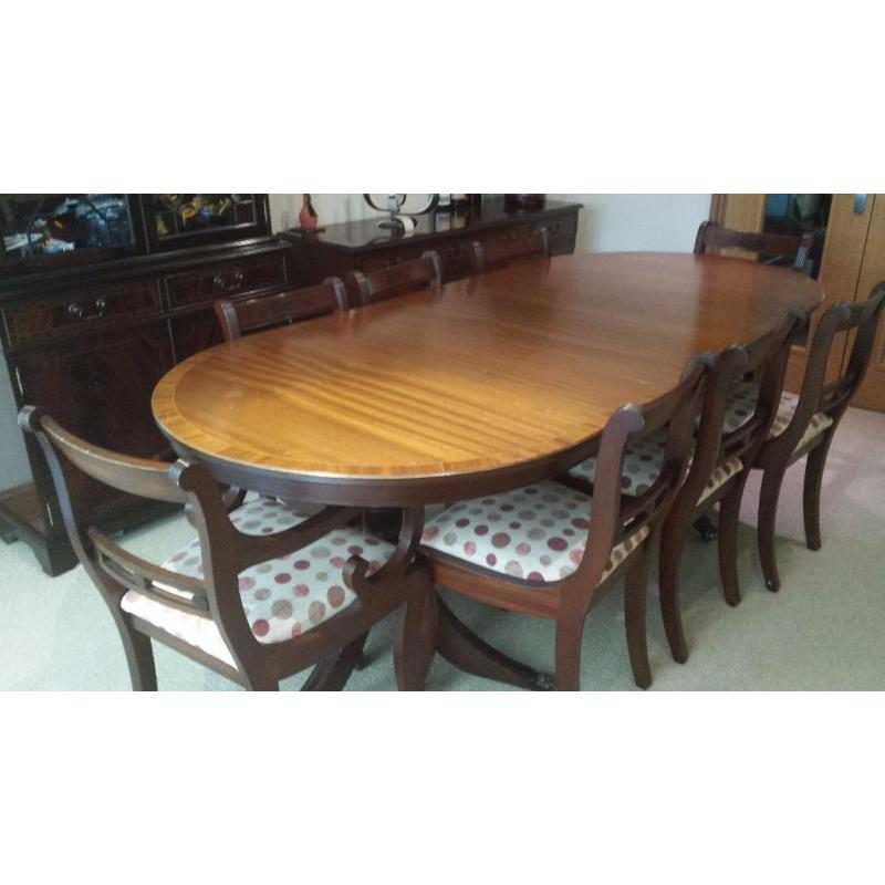 8-seater dining room table with 8 chairs