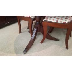8-seater dining room table with 8 chairs