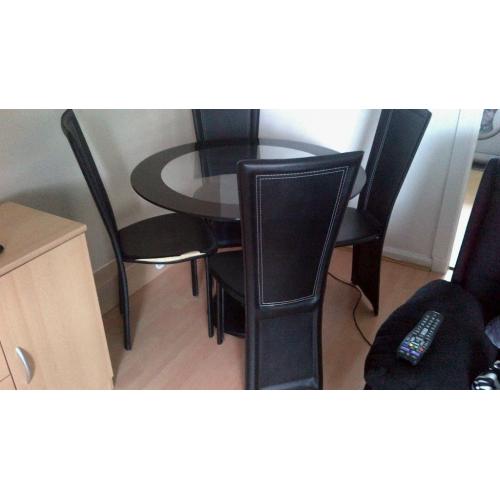 glass table and chairs