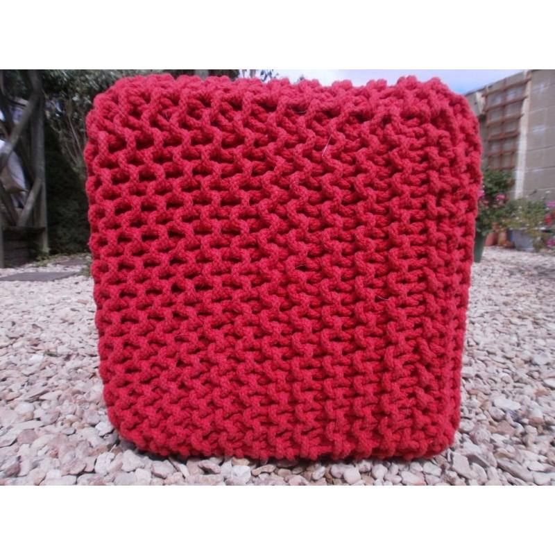 Orange knitted pouffe