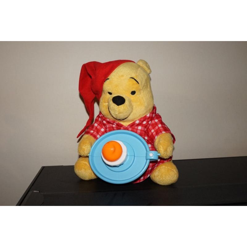 Winnie the pooh interacive toy with candle