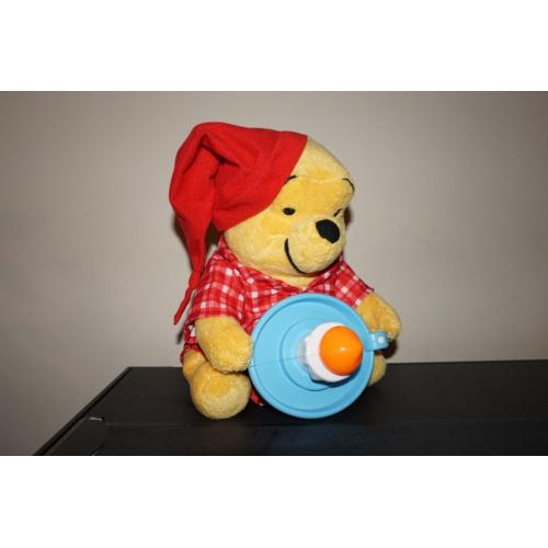 Winnie the pooh interacive toy with candle