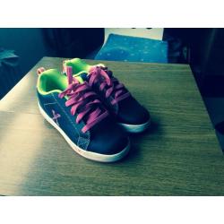 Girls roller quads , Heelys and ice skates for sale.