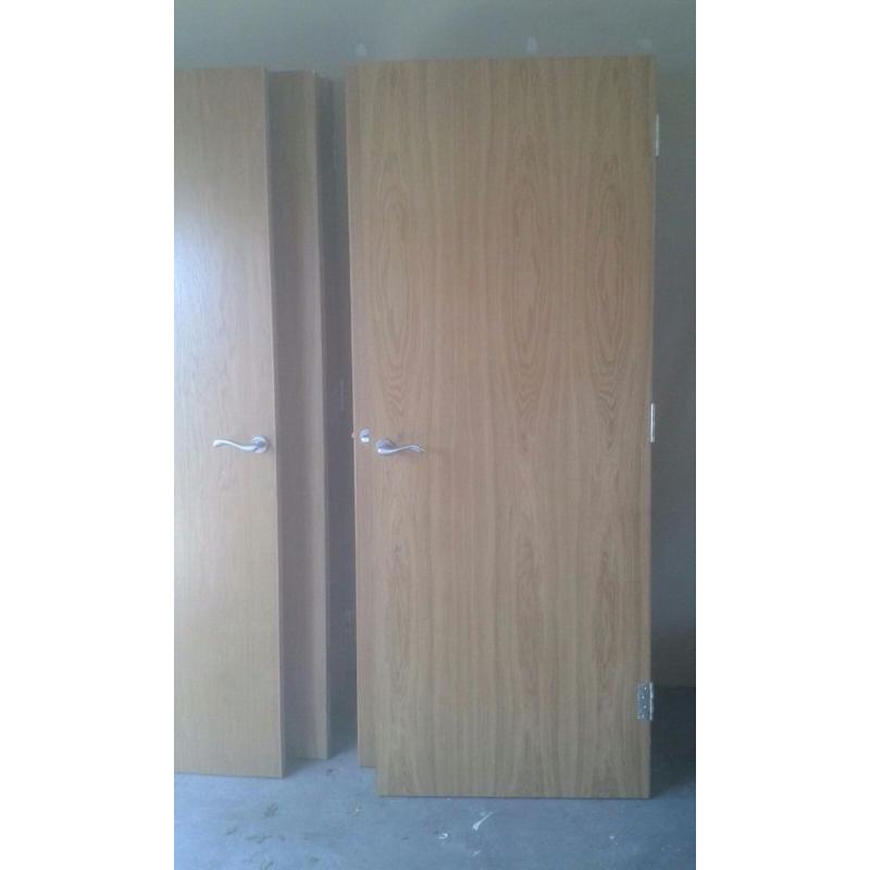 14 used internal oak doors with chrome handles and hindges