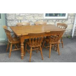A solid pine dining table and 6 chairs (free local delivery)