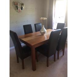 Solid wood dining table