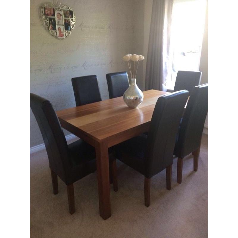 Solid wood dining table