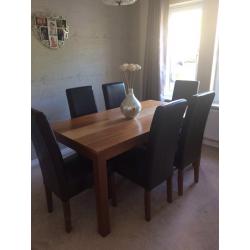 Solid wood dining table