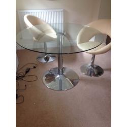Round glass dining table with 4 chairs