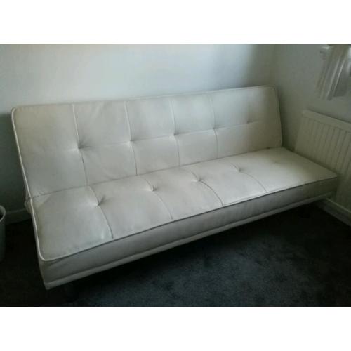 Cream leather double sofa bed.
