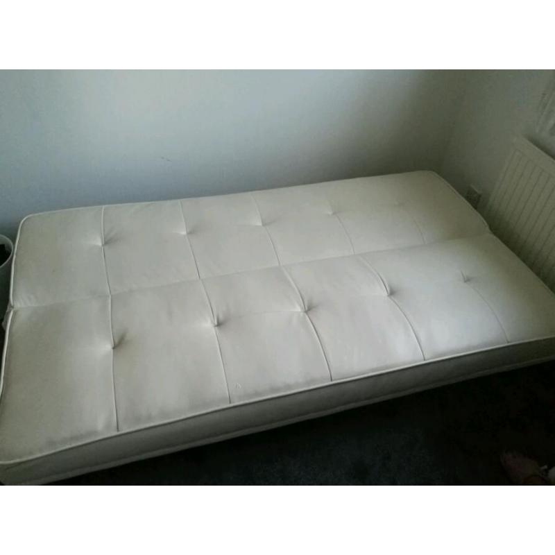 Cream leather double sofa bed.