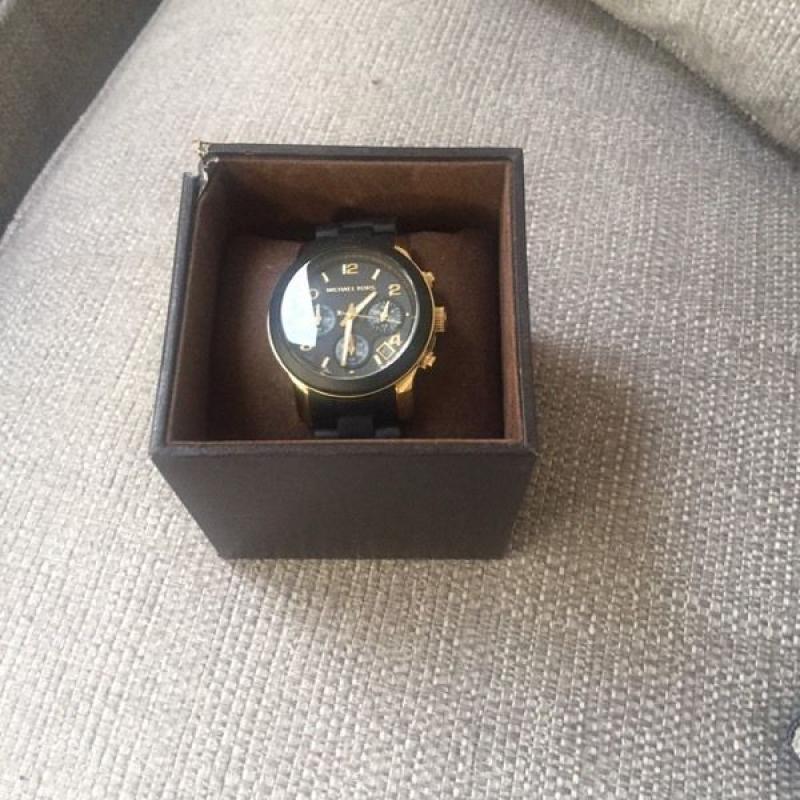 Black and gold michael kors watch