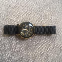Black and gold michael kors watch