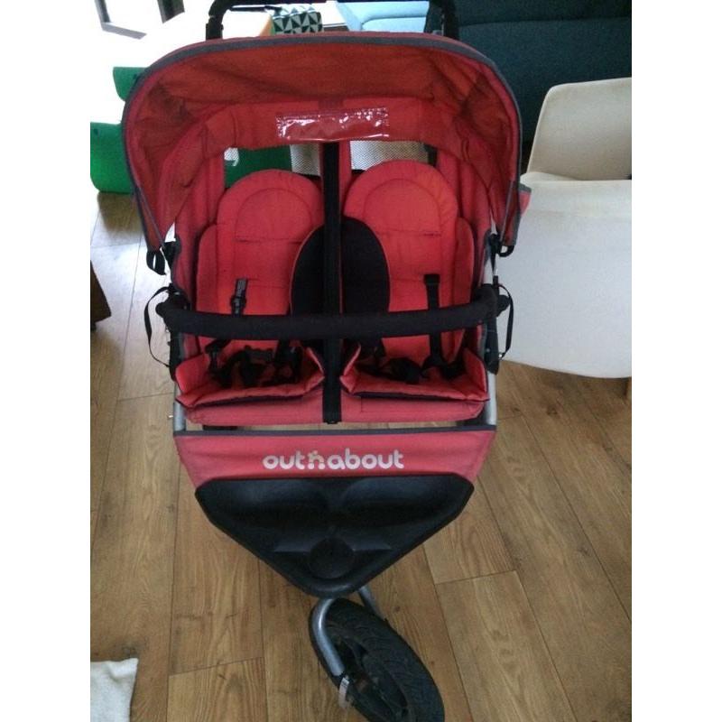 Out n about red double buggy.