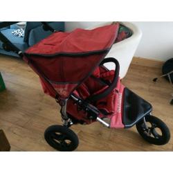 Out n about red double buggy.