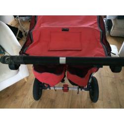 Out n about red double buggy.