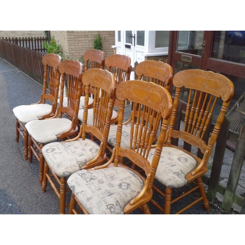8 dining chairs,solid oak,carved back,clean cushion