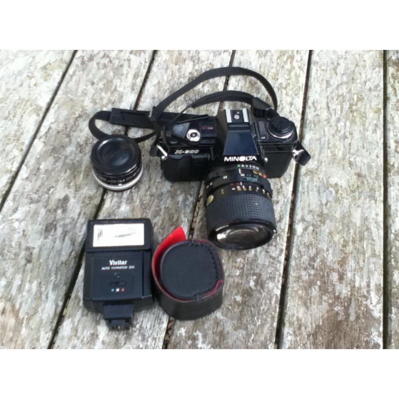 Mimolta X300 film camera with lens