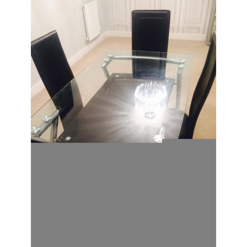 Very good condition glass dinning table ser