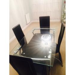 Very good condition glass dinning table ser