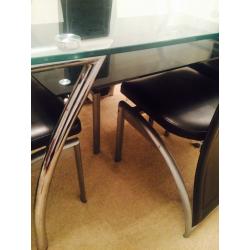 Very good condition glass dinning table ser