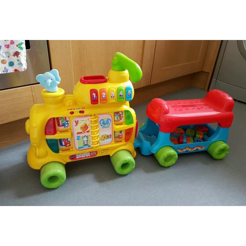 Vtech alphabet ride on train/walker