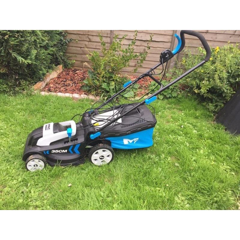 Excellent condition - nearly new electric lawn mower