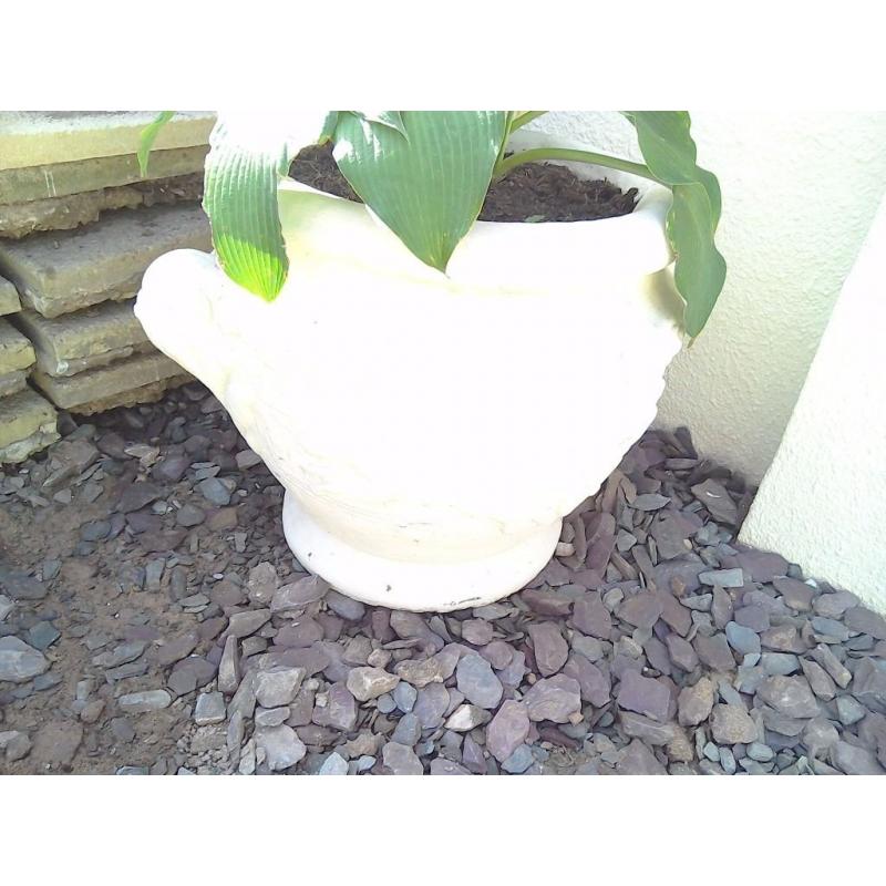 Big heavy stone pot..with Egyptian design on it...