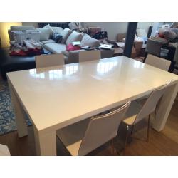 White, Glossy Modern Table and Leather Chairs