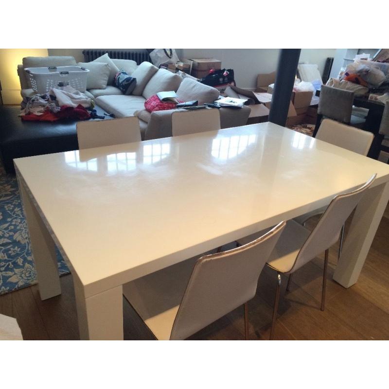 White, Glossy Modern Table and Leather Chairs