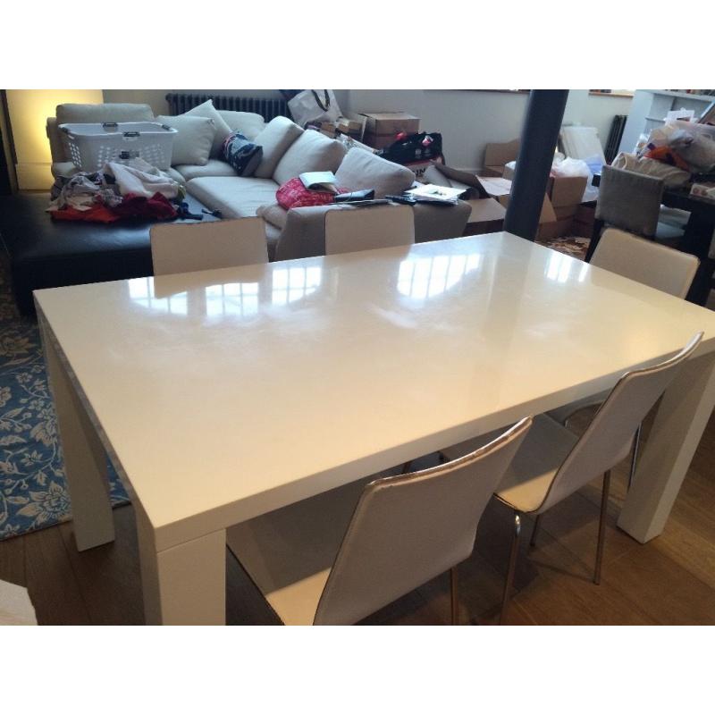 White, Glossy Modern Table and Leather Chairs