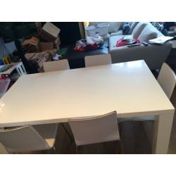 White, Glossy Modern Table and Leather Chairs