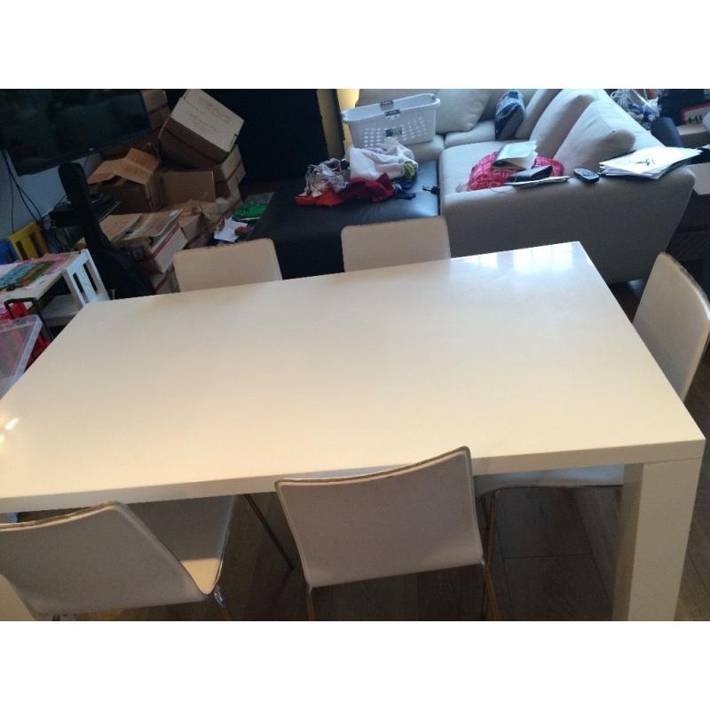 White, Glossy Modern Table and Leather Chairs